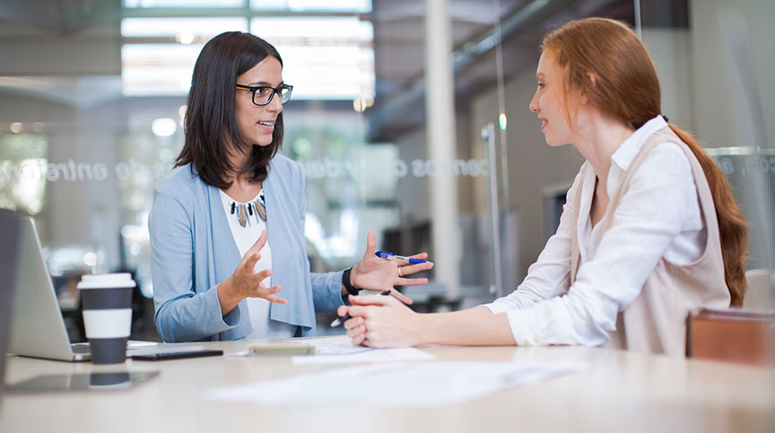 Woman discussing Integrated coaching and leadership training from the Center for Creative Leadership (CCL)